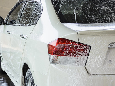 car getting a wash with soap, car washing