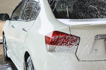 car getting a wash with soap, car washing