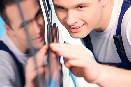 Man Admiring Car After Car Wash