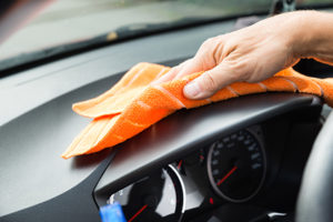 Car Wash Towel Being Used On Dashboard