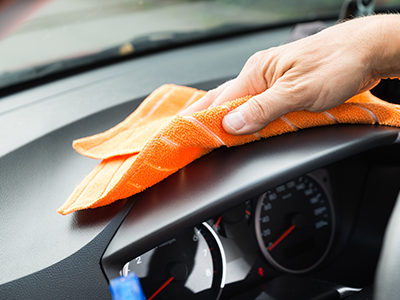 Car Wash Towel Being Used On Dashboard